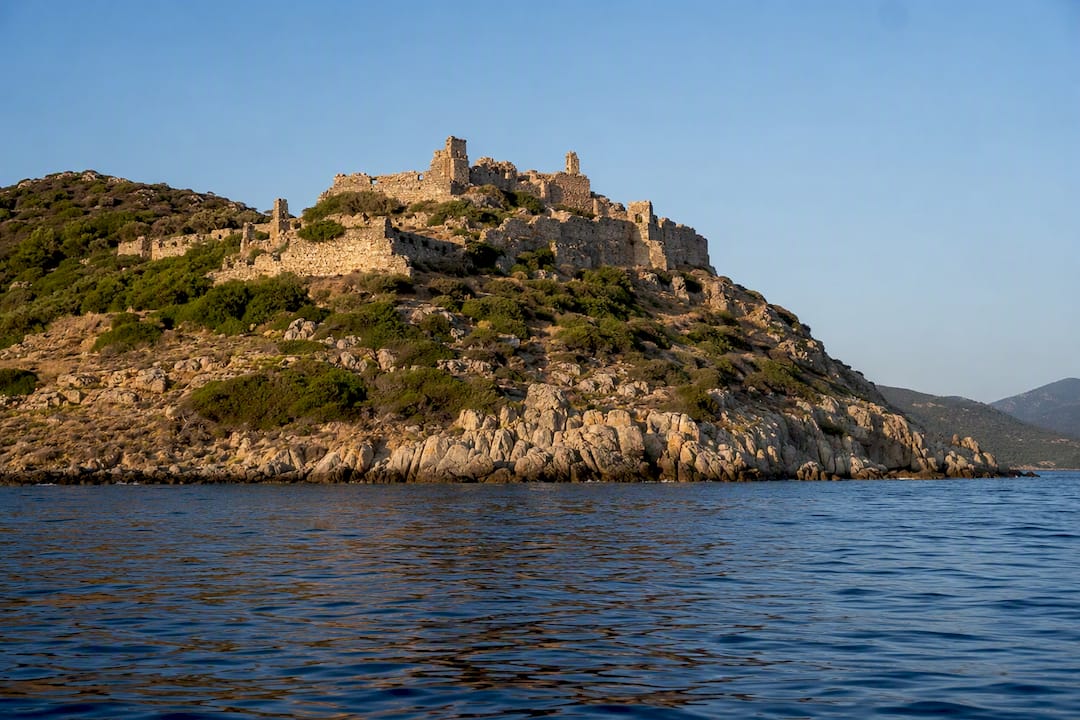 Byzantine fortress ruins seen from sailing boat