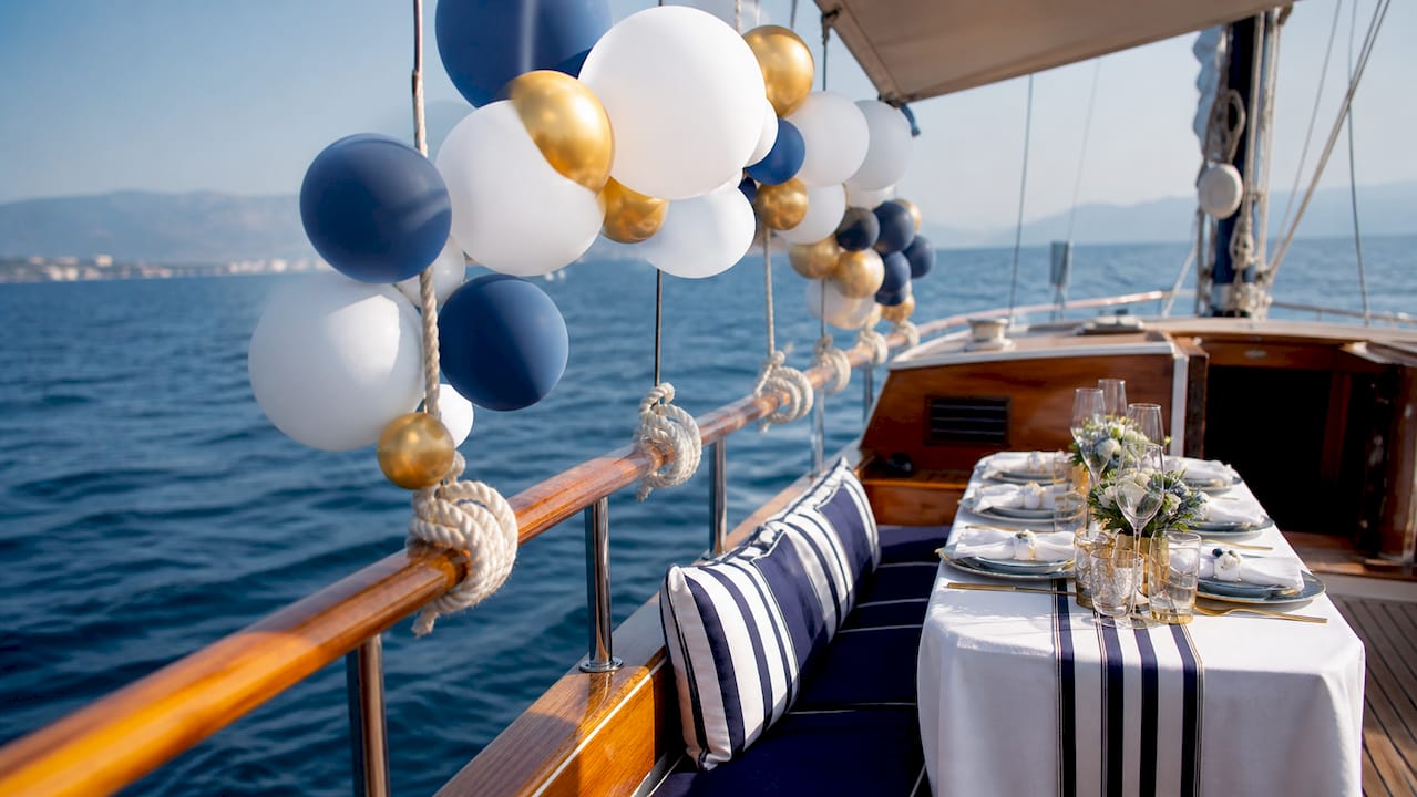 Nautical chic birthday decor on sailing boat deck