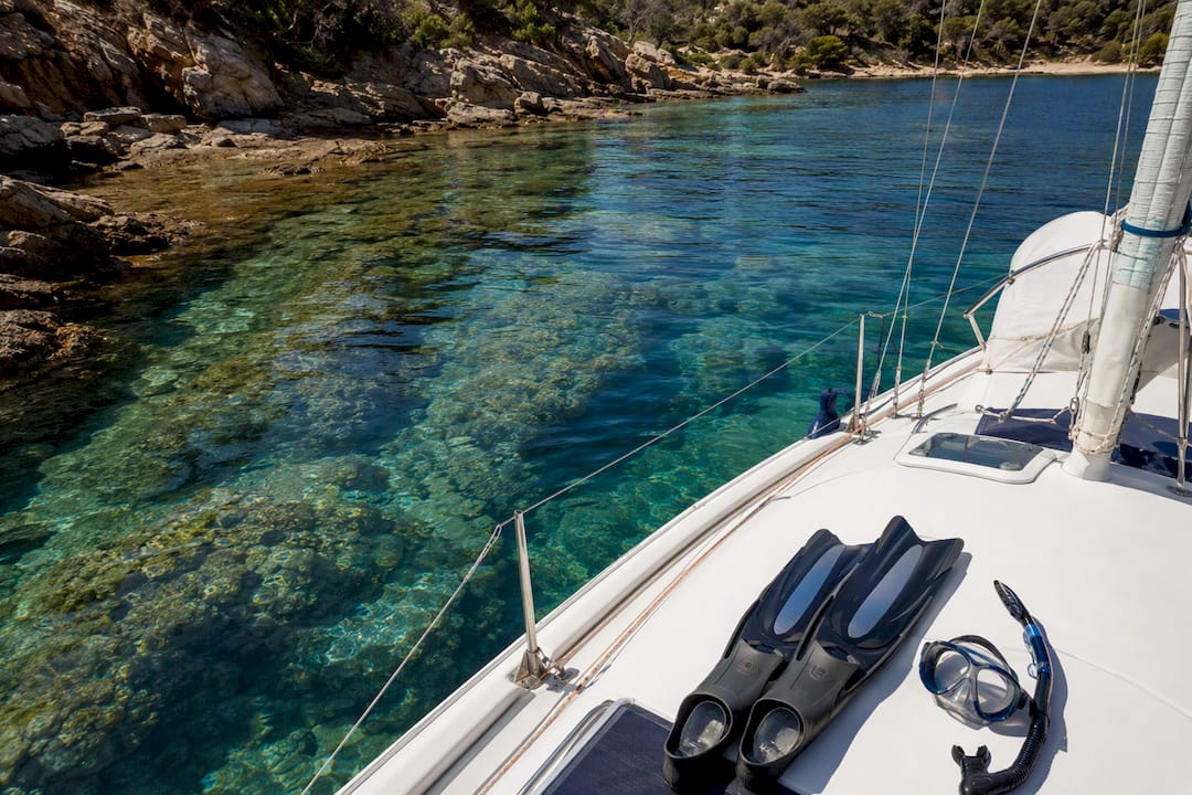 Sailing boat with snorkeling gear ready on deck