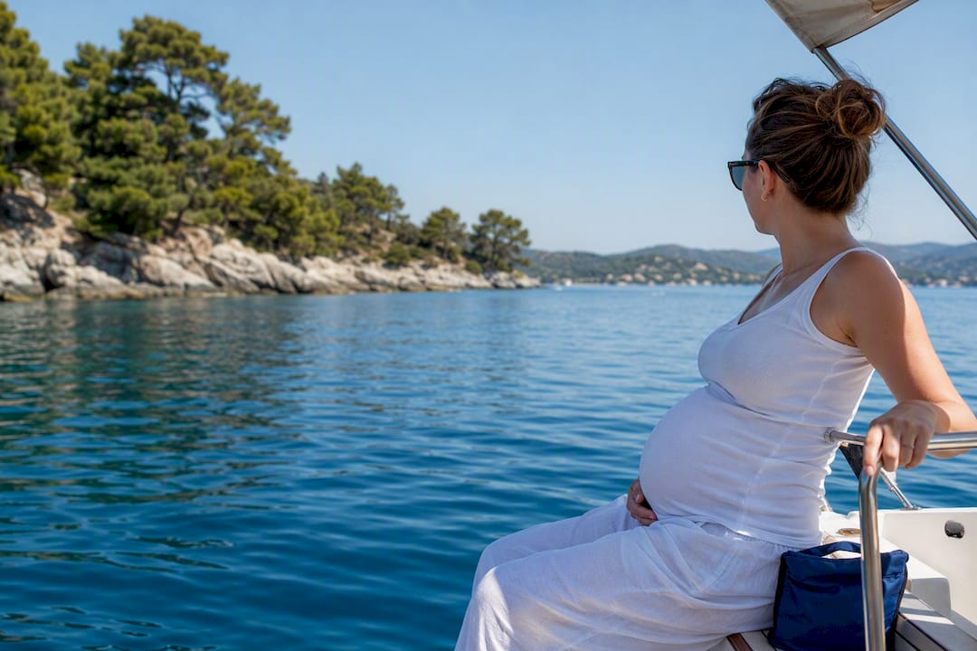 Pregnant traveler seated safely on sailing boat